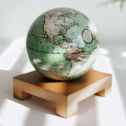 ANTIQUE TERRESTRIAL GREEN GLOBE